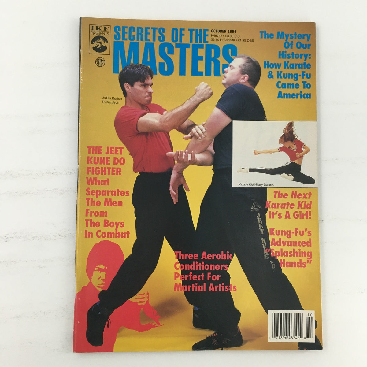 Secrets of the Masters Magazine cover, October 1994 issue featuring Burton Richardson and Hilary Swank, showcasing martial arts themes.