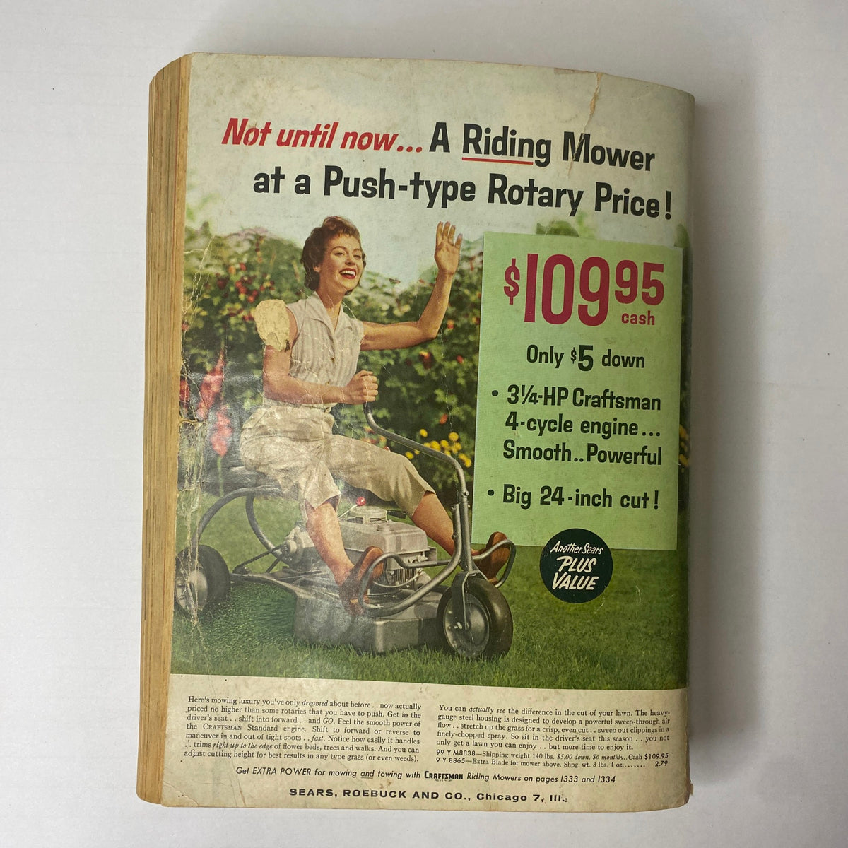 Vintage advertisement from the 1959 Sears Classic Spring and Summer Catalog showcasing a riding lawn mower. The ad features a woman joyfully using the mower in a lush garden setting, highlighting its affordable price of $109.95 with additional details about engine performance and cutting capability.