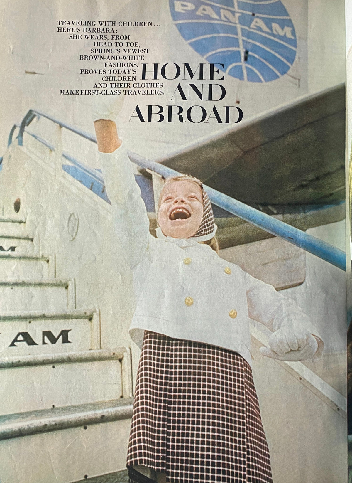 Child in vintage fashion from Vogue Children's Fashions - Spring Summer 1965 Catalog, happily waving while dressed in classic spring attire at a Pan Am terminal.