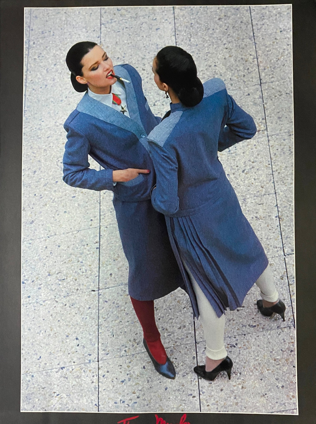 Fashion spread from Vogue Paris Magazine, October 1978, featuring two models styled in sophisticated outfits and showcasing 1970s fashion trends.