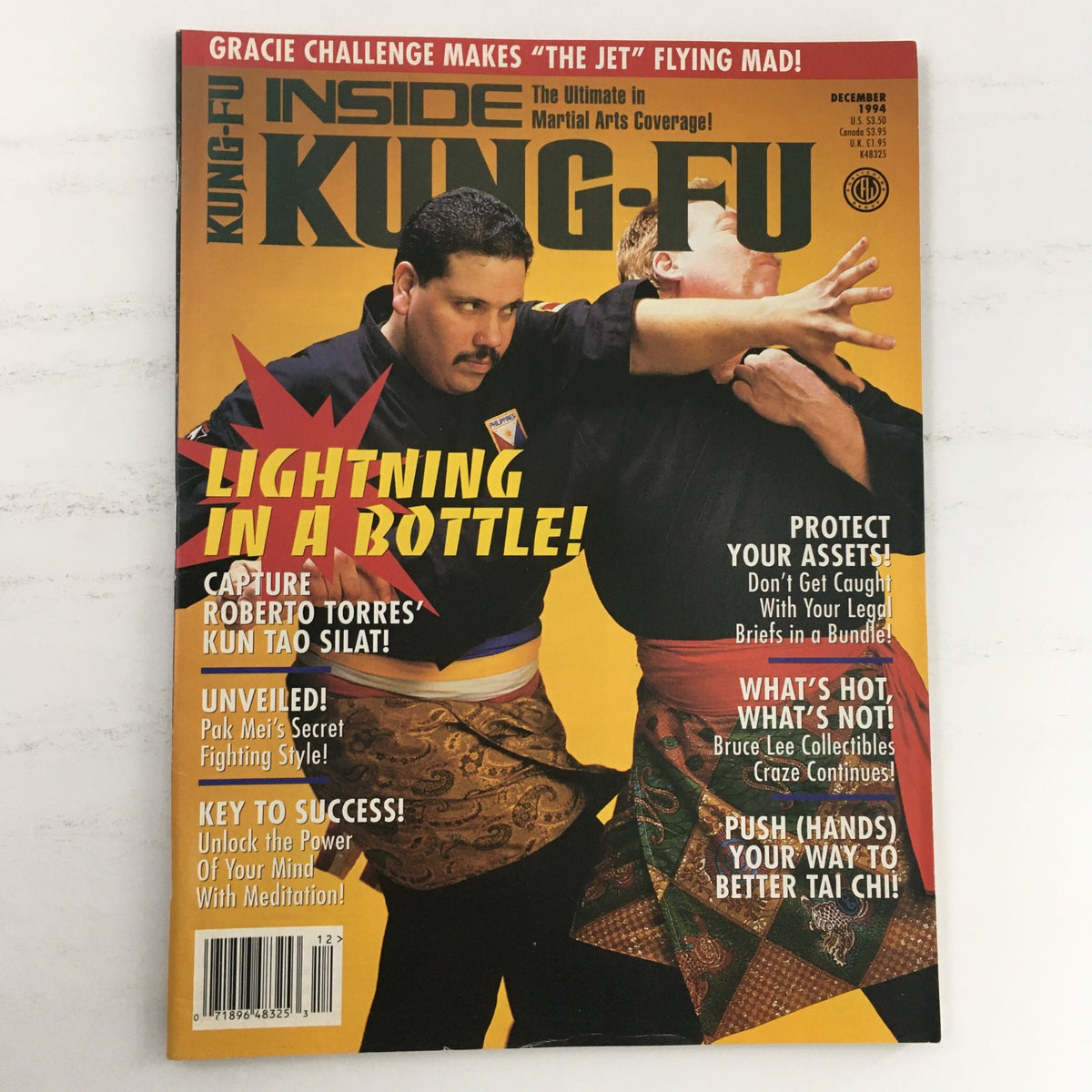 Cover of Inside Kung Fu Magazine December 1994 Vol 21 #12 featuring Roberto Torres' Kun Tao Silat with bold title 'Lightning in a Bottle'.