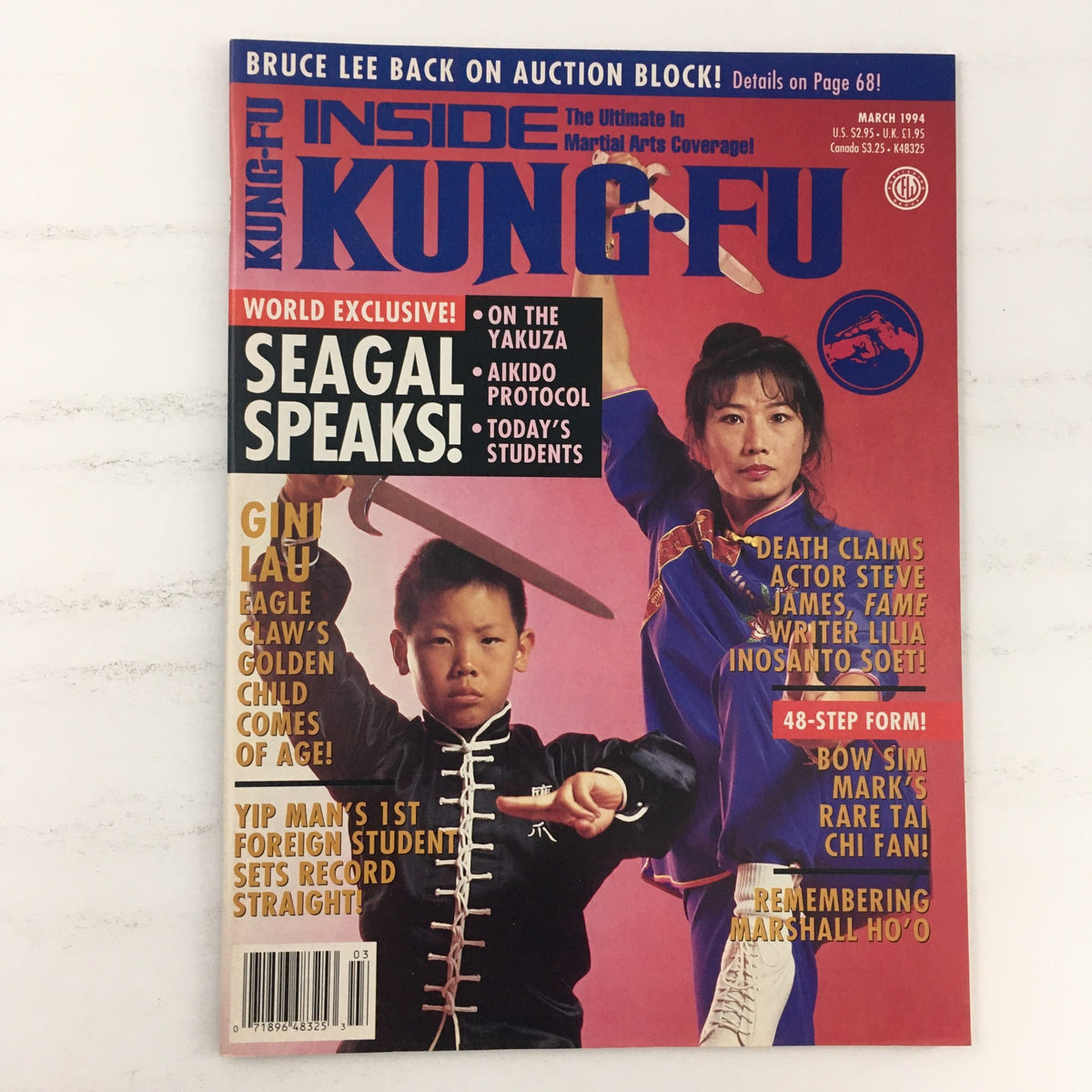 Inside Kung Fu Magazine March 1994 Vol 21 #3 featuring Gini Lau on the cover, showcasing martial arts culture with highlights on Seagal and Eagle Claw's Golden Child.