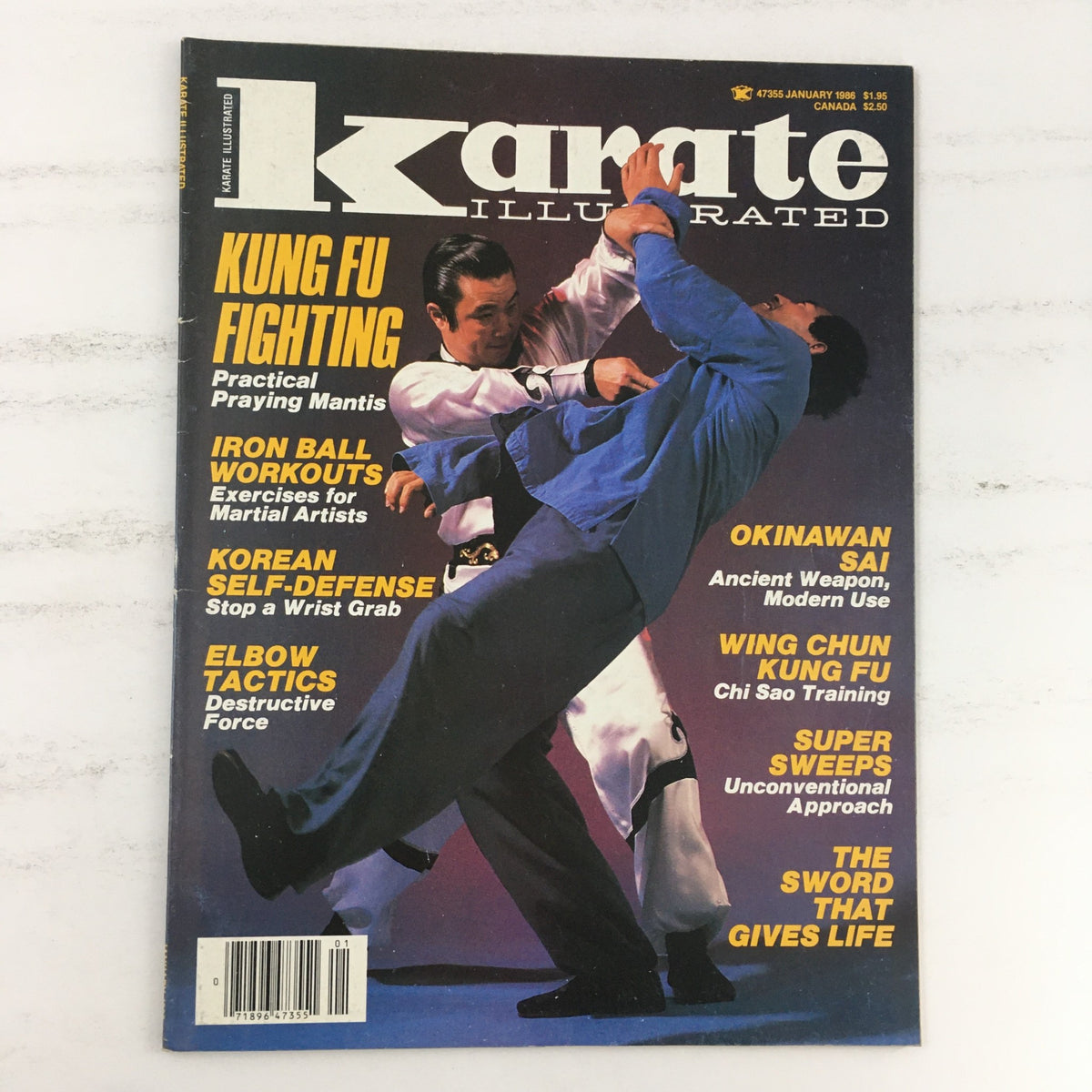 Cover of Karate Illustrated Magazine January 1986 Vol 17 #1 featuring Brendan Lai demonstrating Praying Mantis techniques. Includes titles such as 'Kung Fu Fighting' and 'Iron Ball Workouts'.