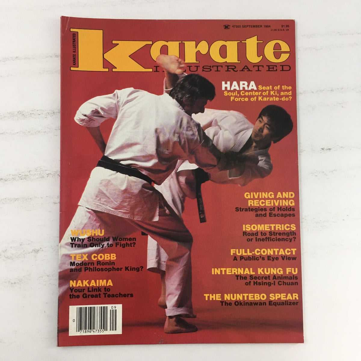 Cover of Karate Illustrated Magazine September 1984, Volume 15, Issue 9 featuring martial artists in traditional karate attire. Highlights include Hirokazu Kanazawa and topics on HARA, giving and receiving, and internal kung fu.