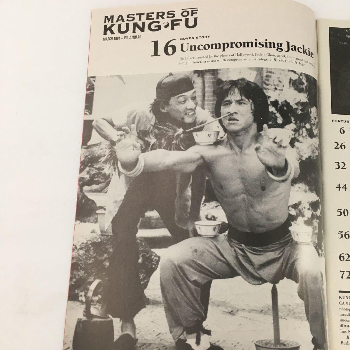 Inside page of Masters of Kung Fu Magazine March 1994 Vol 1 #10 showcasing a black and white image of Jackie Chan in an action scene, emphasizing his dynamic performance.