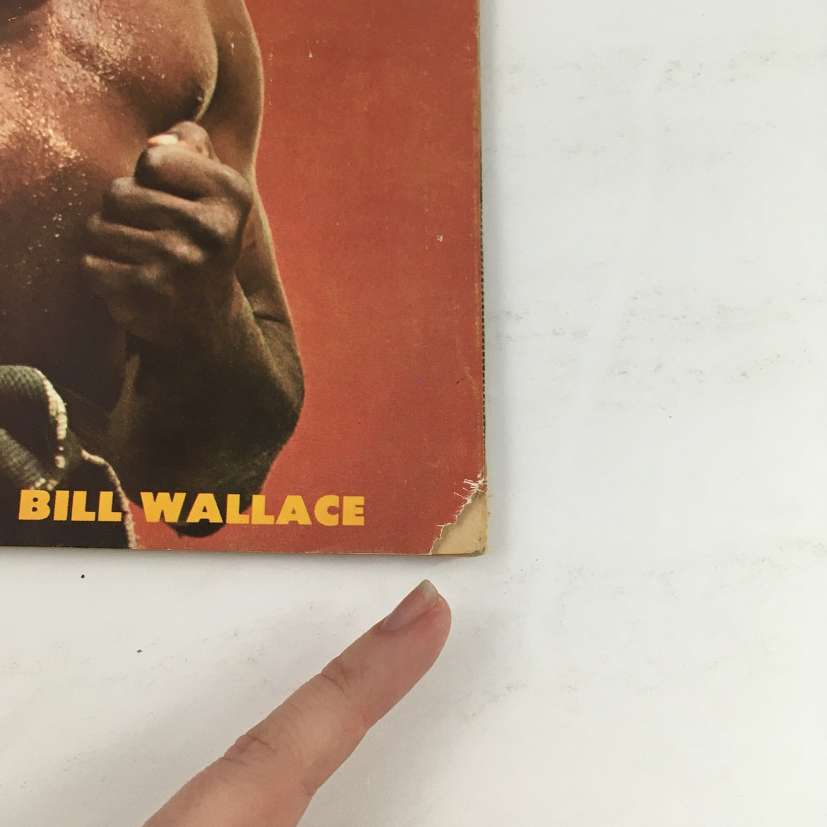 Cover detail of Professional Karate Magazine March 1975 Vol 2 #2 highlighting Bill Wallace with visible wear and tear.