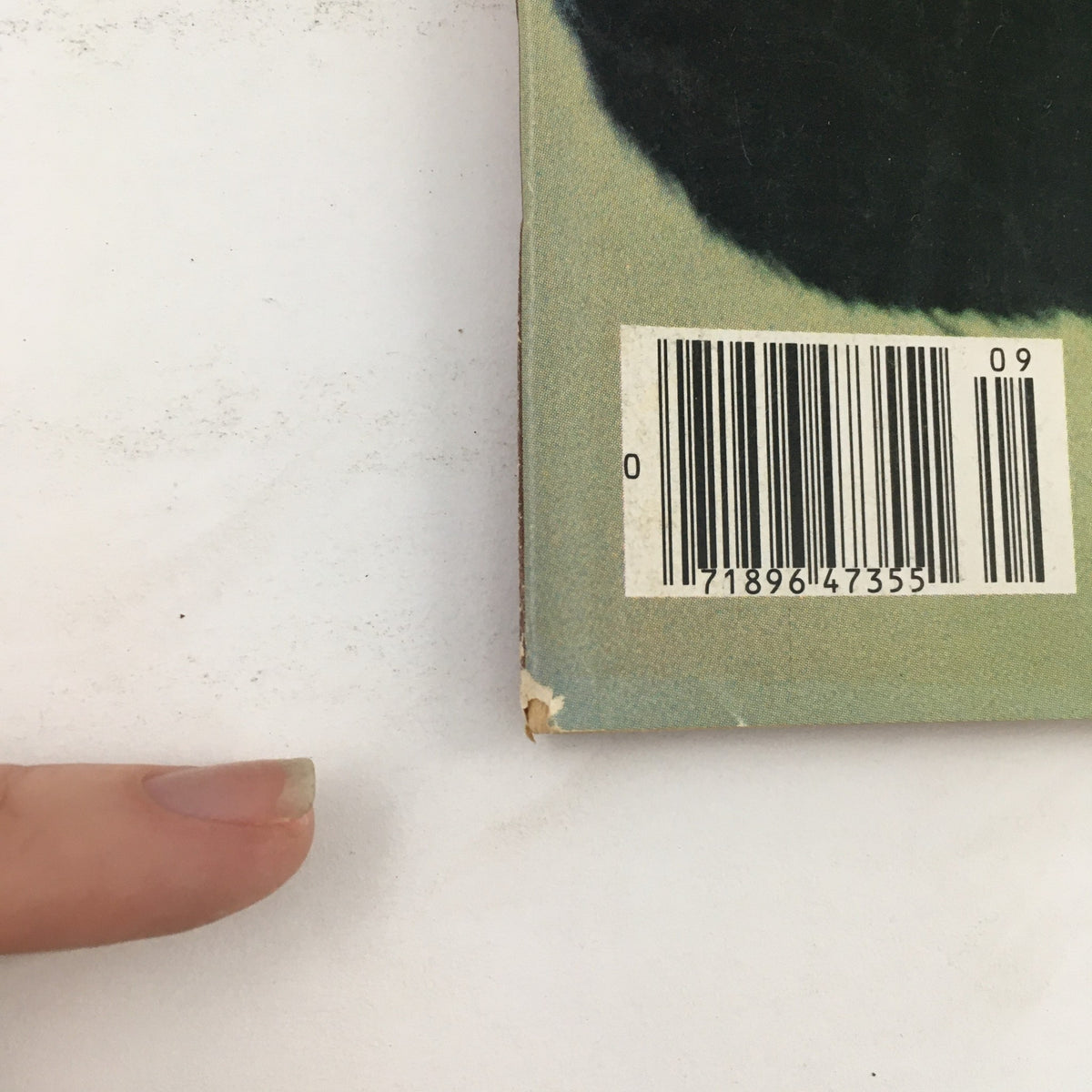 Side view of Karate Illustrated Magazine September 1977 Vol 8 #9 showing barcode and slight damage, indicative of its age and collectibility.