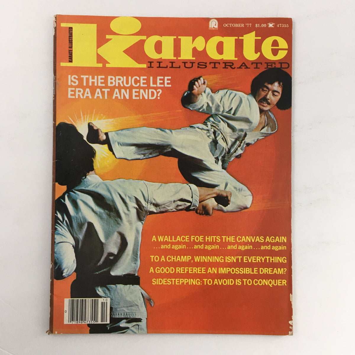 Cover of Karate Illustrated Magazine, October 1977, featuring a striking image related to martial arts and the question, 'Is the Bruce Lee era at an end?'