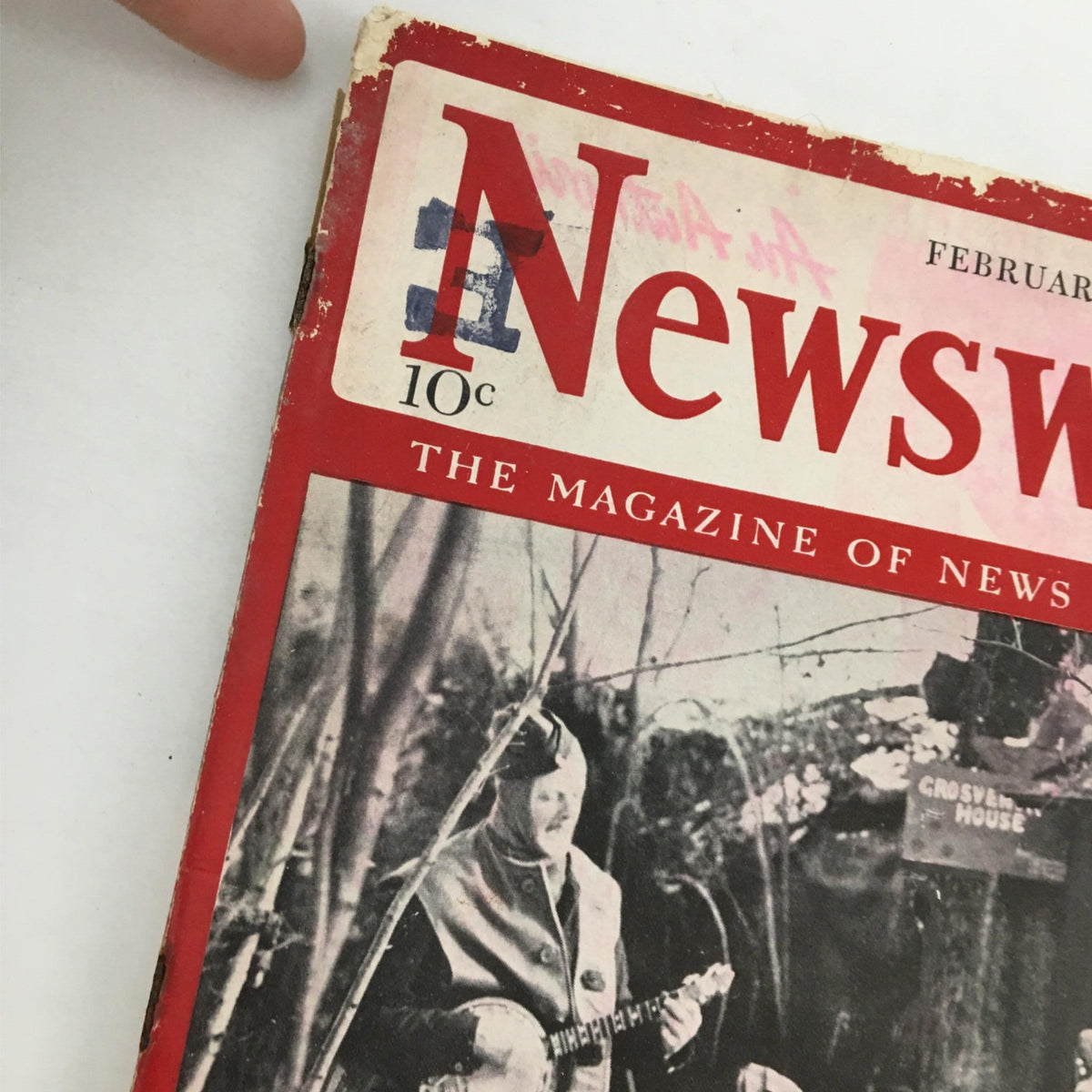 Detailed view of the top left corner of the Newsweek Magazine cover from February 26, 1940, displaying the title and the text '10c The Magazine of News Significance' with vintage wear visible.
