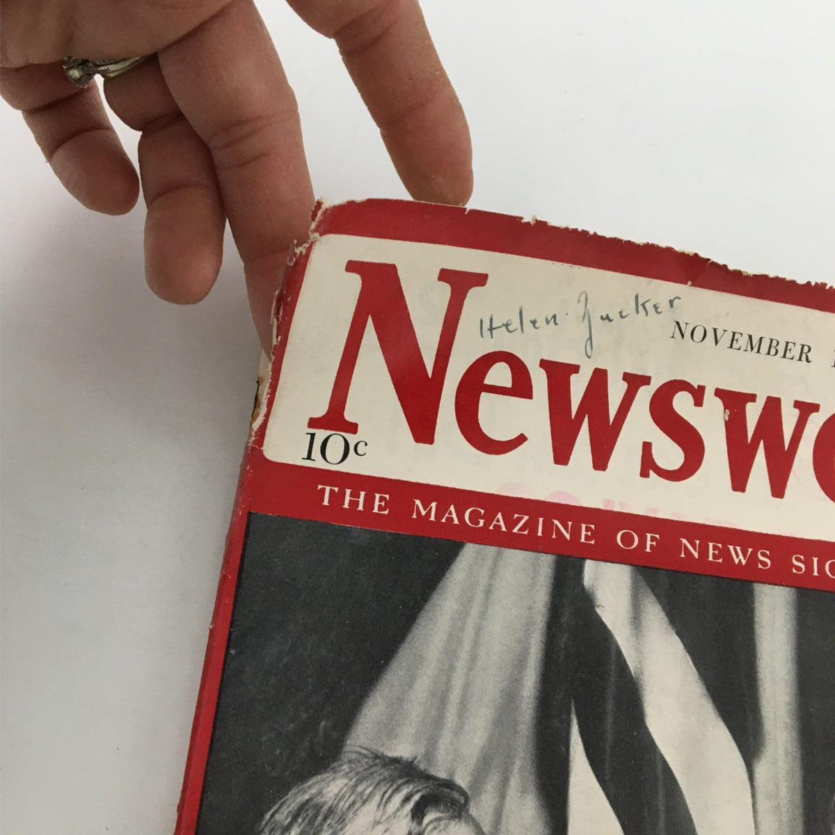 Close-up of the Newsweek Magazine cover dated November 11, 1940, displaying the title 'What Roosevelt's Reelection Means to Nation', with handwritten note and wear indicative of its historical significance.