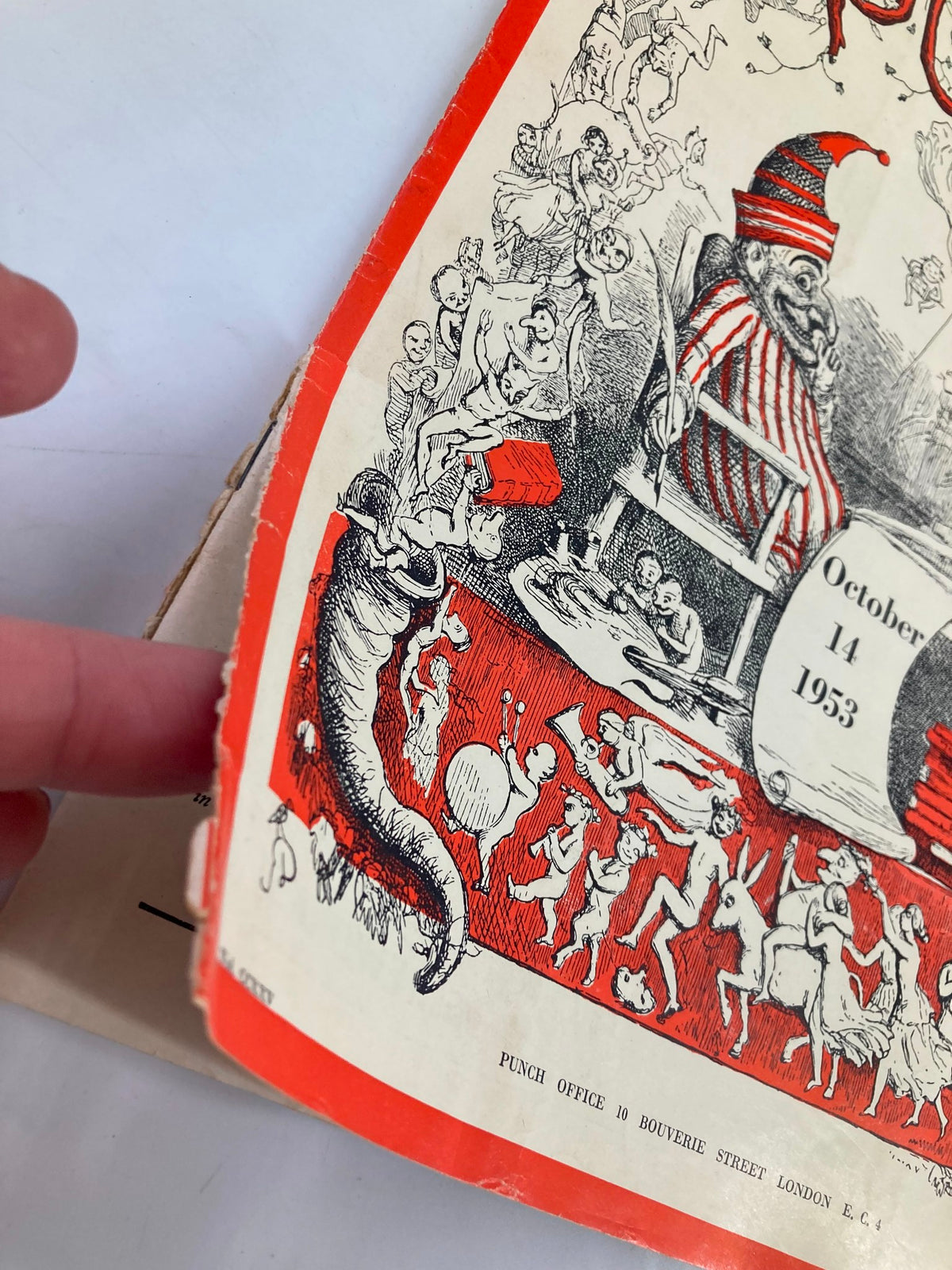 Close-up view of the cover of VTG Punch Magazine October 14, 1953, highlighting the detailed artwork and wear on the magazine.