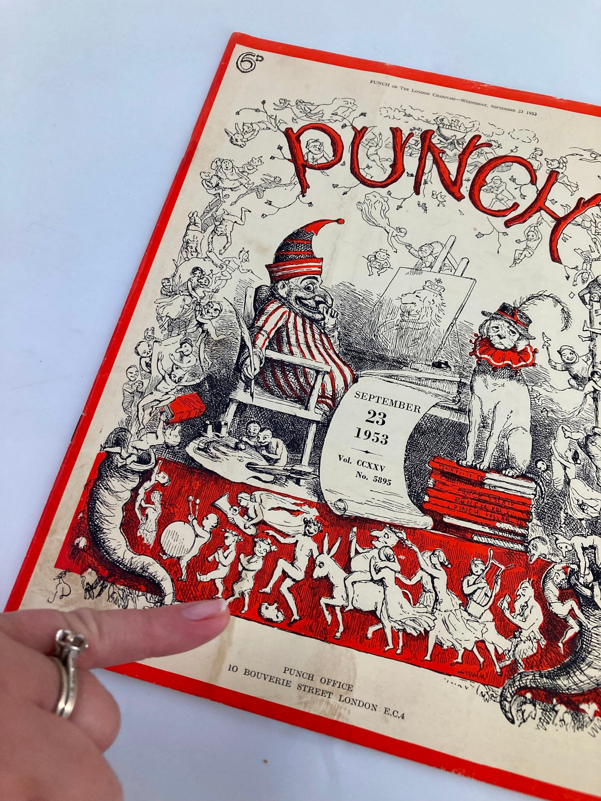Detailed view of VTG Punch Magazine September 23, 1953 Vol 225 #5895 cover showcasing humorous cartoons and artwork.