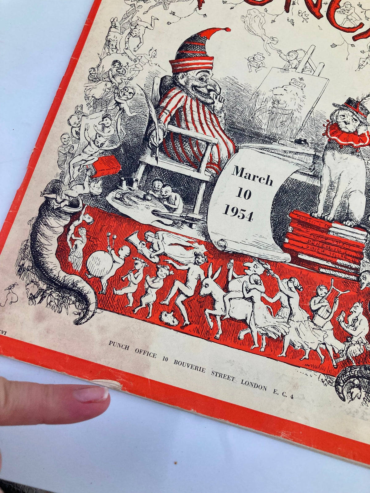 Close-up of the cover of VTG Punch Magazine March 10, 1954, highlighting details of the cartoon artwork and condition of the magazine.