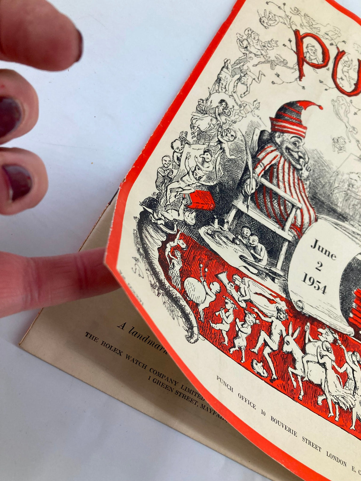 Close-up view of the front cover of VTG Punch Magazine June 2 1954 Vol 226 #5933, displaying colorful cartoons and a humorous design indicative of 1950s British satire.