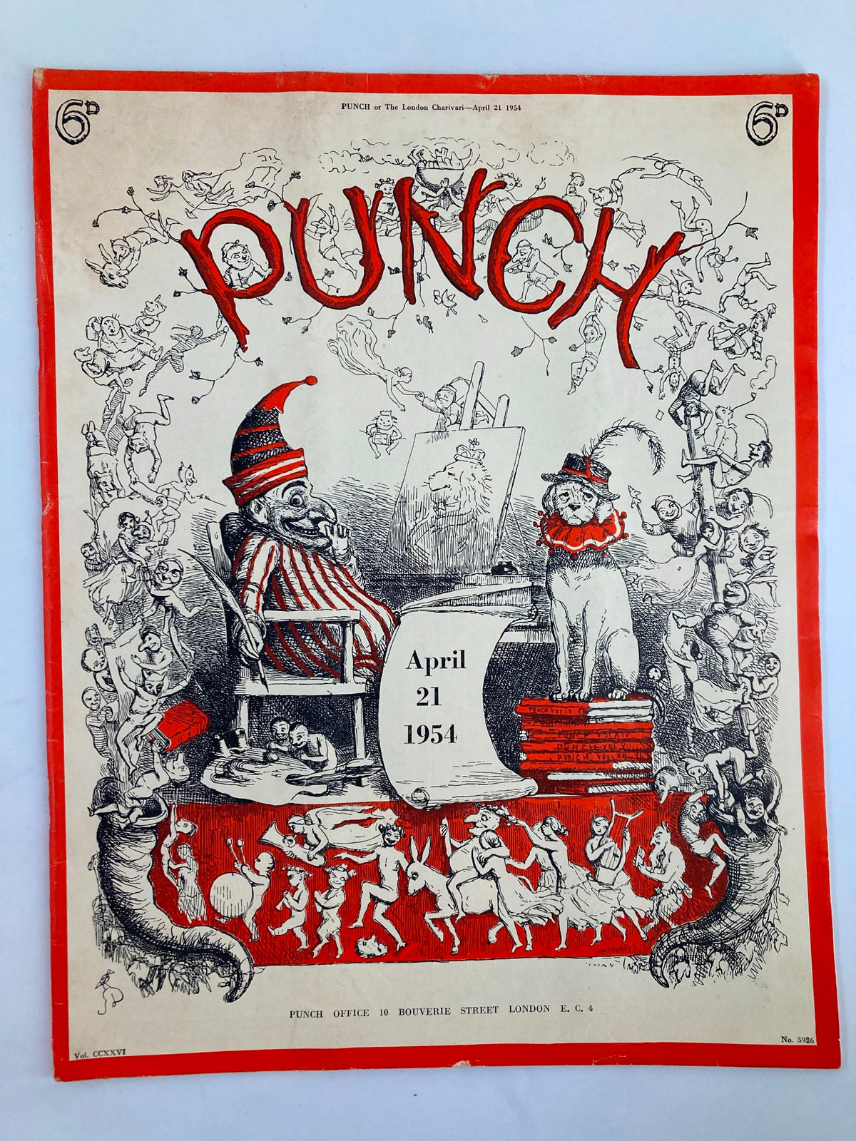 Cover of VTG Punch Magazine from April 21, 1954, featuring colorful illustrations and the title 'PUNCH' prominently displayed.