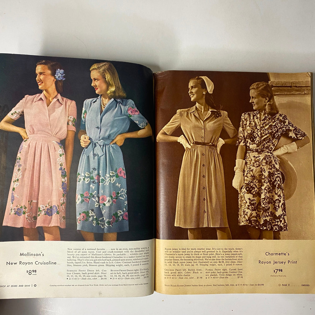 Interior page of the 1944 Sears, Roebuck and Co. Spring and Summer Catalog displaying three fashionable dresses, highlighting 1940s styles.