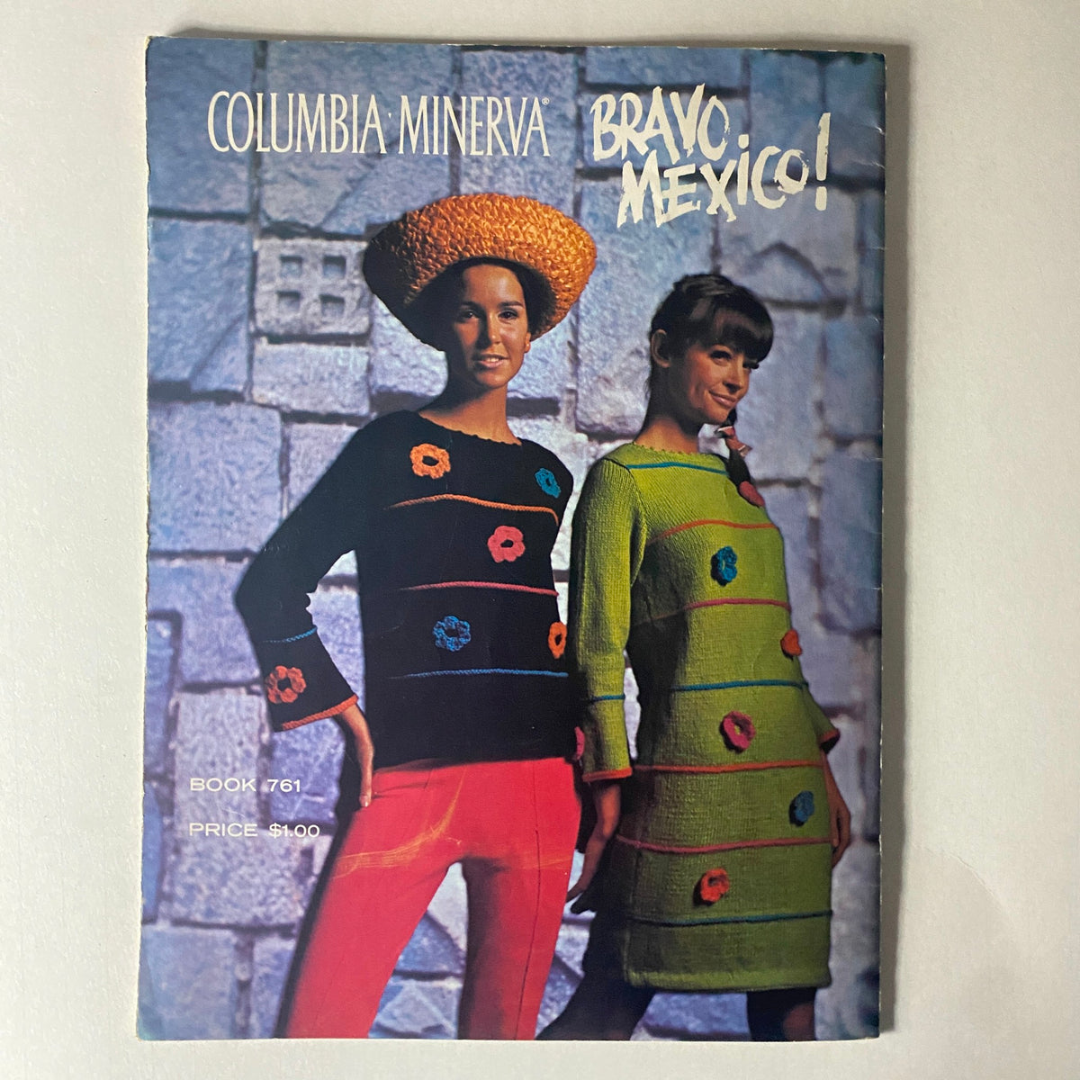 Cover of the 1966 Columbia Minerva Bravo Mexico Knits Pattern Book featuring models in colorful knitted outfits against a textured wall, highlighting vibrant mid-century knitting styles inspired by Mexican culture.
