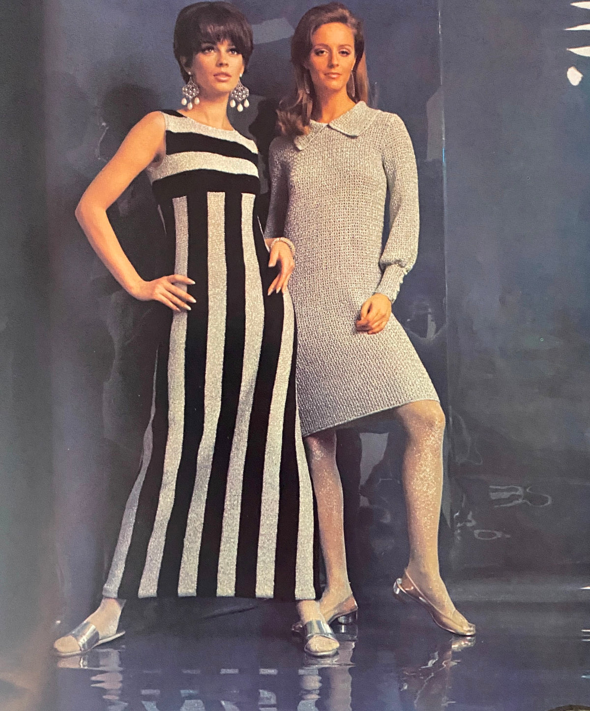 1967 Columbia Minerva Reflecting Fashion showcasing two women in striking knit dresses, emphasizing classic 1960s fashion styles in a reflective setting.