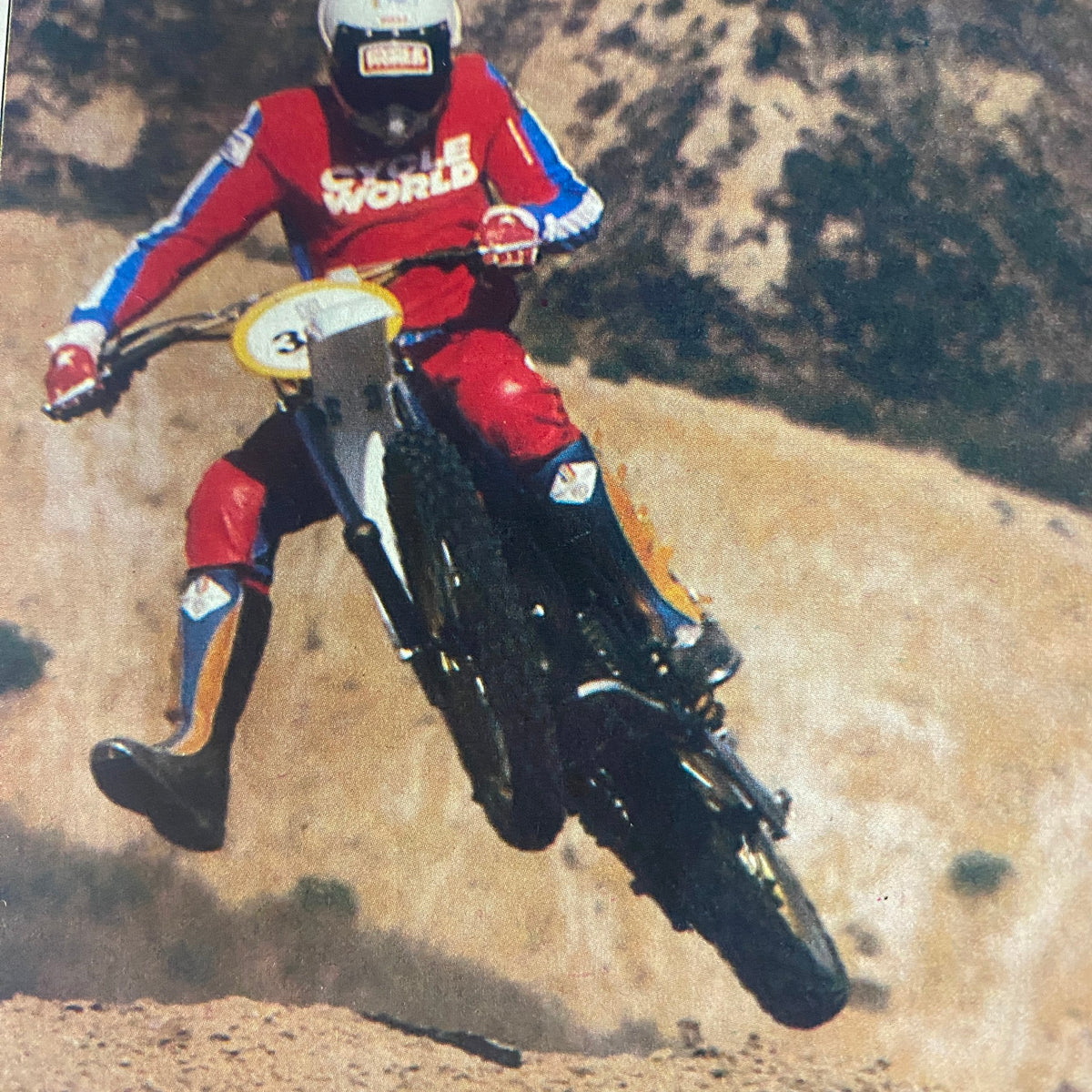 Action shot of motocross rider in Cycle World Magazine – December 1979 demonstrating skills with a dirt bike.