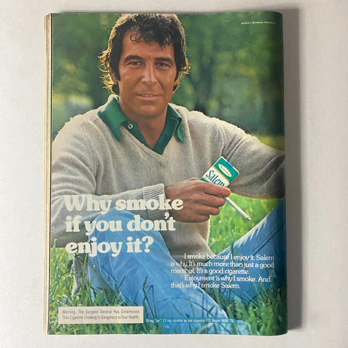 Cycle World Magazine October 1975 advertisement page promoting Salem cigarettes with a model presenting the product outdoors.