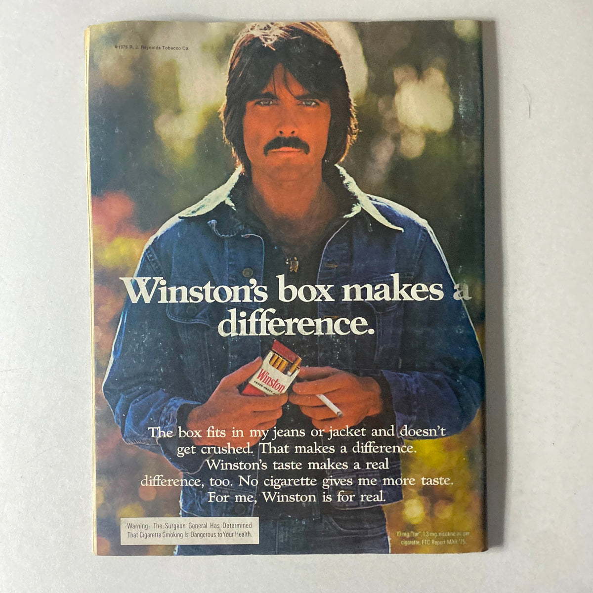 Vintage advertisement from Cycle World Magazine February 1976 featuring Winston cigarettes, representative of 1970s advertising trends.