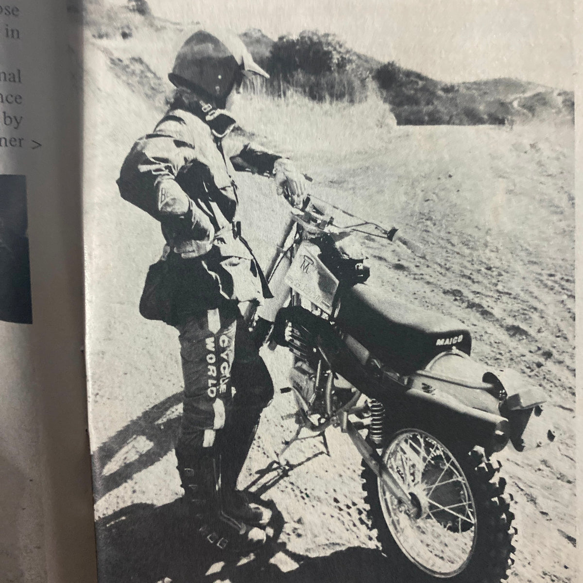 Photograph from Cycle World Magazine February 1976 showing a rider in motocross gear alongside a Maico 250WR Cross Country motorcycle.