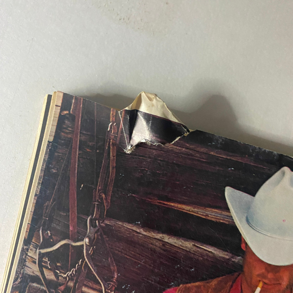 Close-up of the top corner of Motorcyclist Magazine June 1978, highlighting the worn edge and vintage Marlboro advertisement.