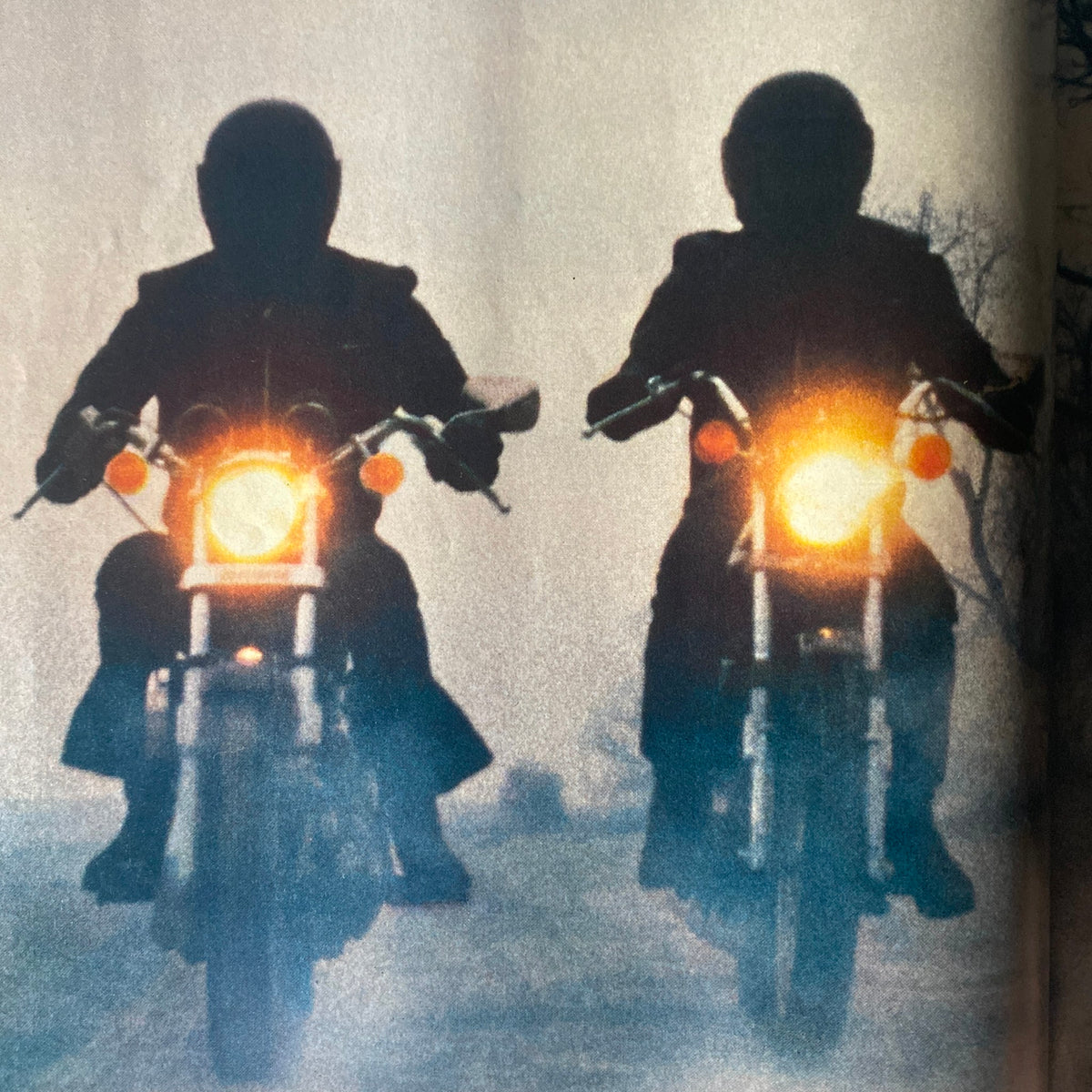 Cycle Guide Magazine July 1977 features two motorcyclists riding in the mist, showcasing the spirit of motorcycle culture from the 1970s.
