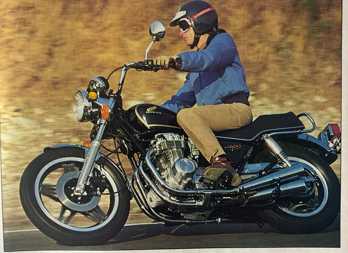 Vintage image of a rider on a Honda CB650 Custom motorcycle, taken from Cycle Guide Magazine December 1979, illustrating biking culture.