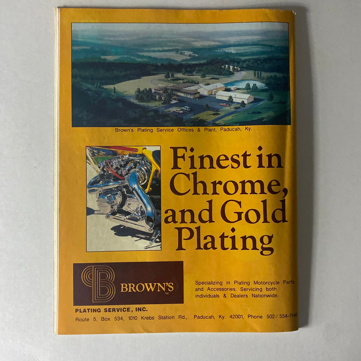 Advertisement in Cycle Guide Magazine November 1979 for Brown's Plating Service, promoting chrome and gold plating for motorcycle parts, showcasing motorcycle customization options.