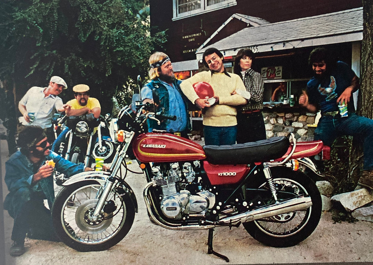 Group of motorcycle enthusiasts with a Kawasaki KZ1000 bike, featured in Cycle World Magazine March 1978, capturing the culture of motorcycle riding.
