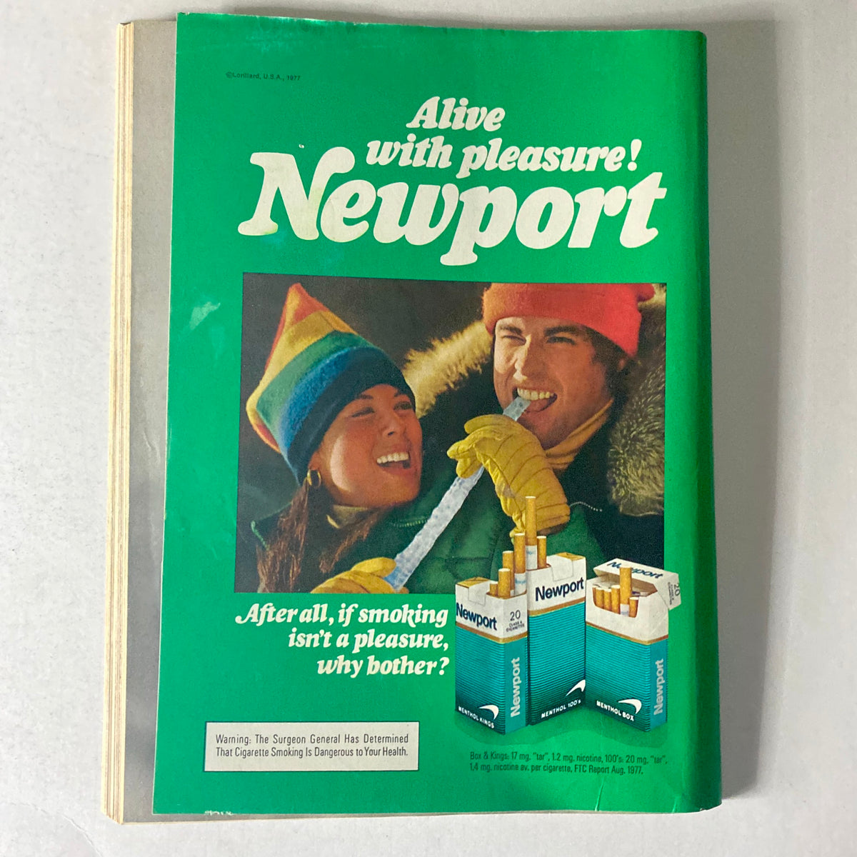 Advertisement from Cycle World Magazine March 1978 promoting Newport cigarettes with a vibrant green background and playful imagery.