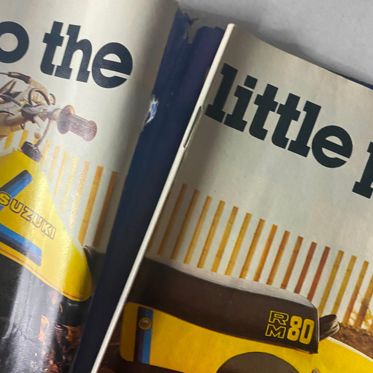 Inside view of Cycle Guide Magazine July 1979 displaying content related to Suzuki motorcycles, including RM models, with distinct typography showcasing articles.