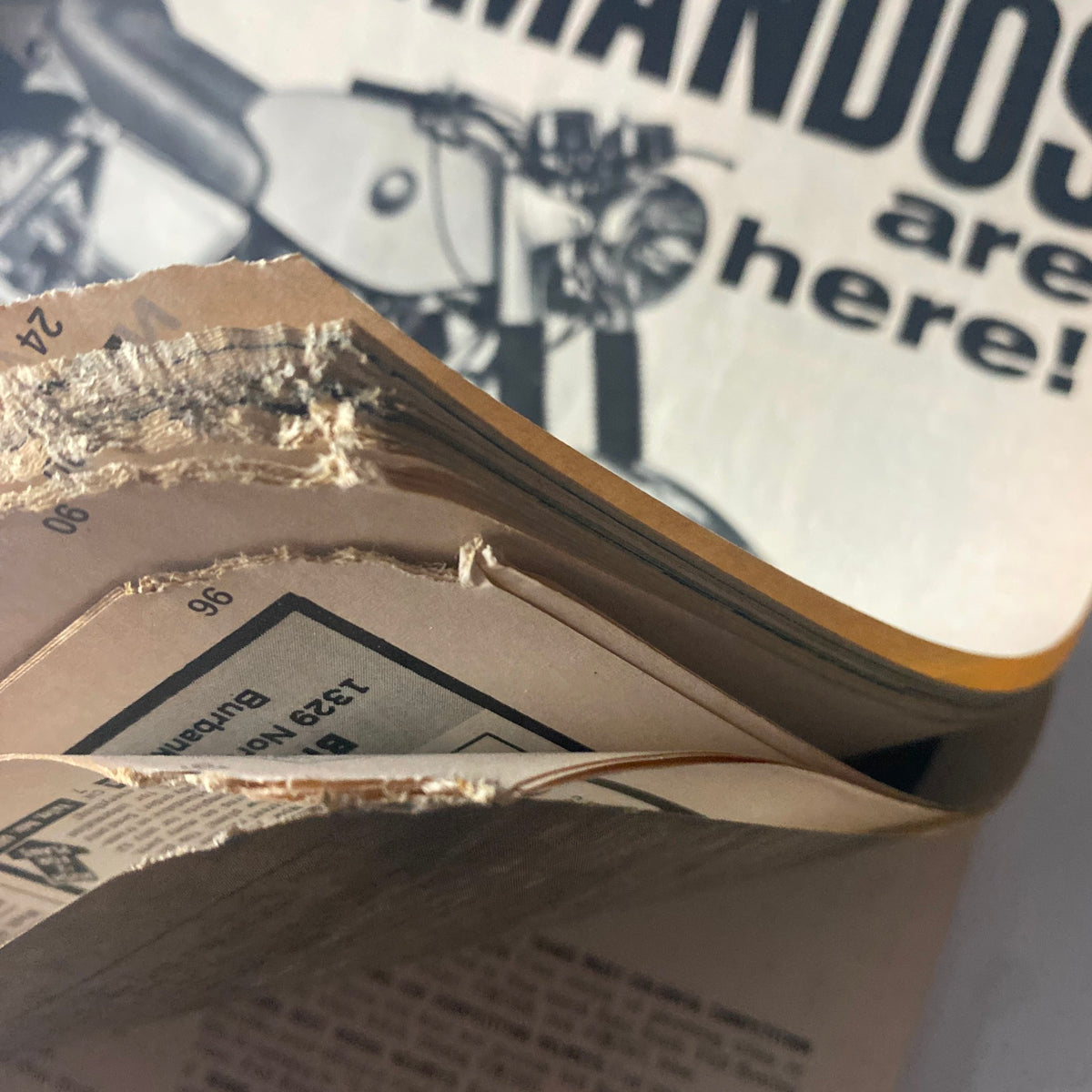 Cycle World Magazine July 1968, showing the edges of the magazine pages with visible wear and tear, highlighting its condition as an authentic vintage piece.