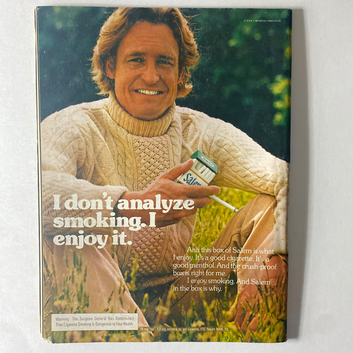 Cover of Cycle World Magazine December 1975 featuring Win Muldrow riding a Yamaha XS500C, showcasing a bold advertisement for Salem cigarettes with the tagline 'I don't analyze smoking. I enjoy it.'