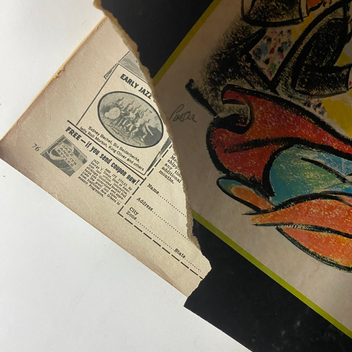 Detail from Nugget Magazine November 1957 revealing an advertisement with text for 'Early Jazz' and a partially torn page, emphasizing the vintage magazine's condition and charm.