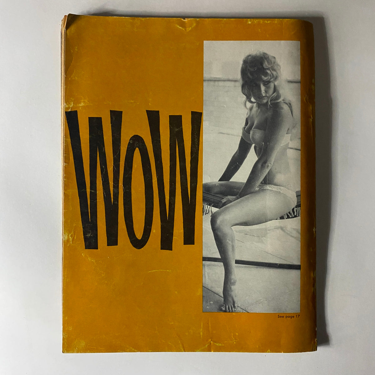 Back cover of Scamp Magazine March 1961 showcasing a model with WOW headline.