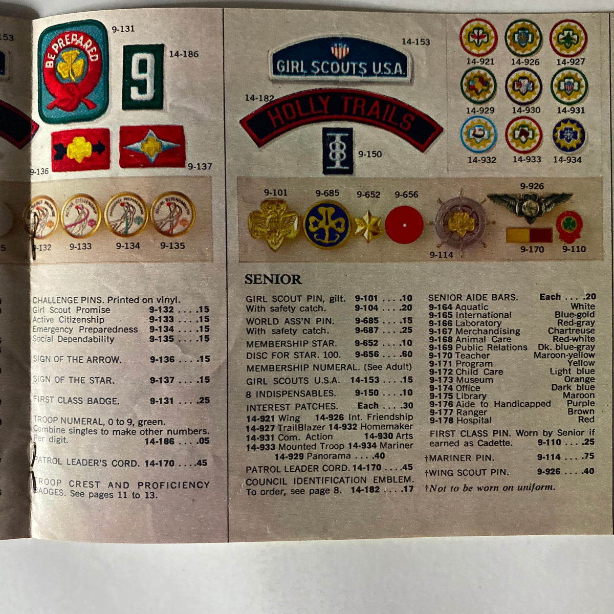 1967 Official Dress Uniforms for Girl Scouts Catalog page detailing various insignia and badges for Girl Scouts, including pins and patches, presented in a clear and organized layout.