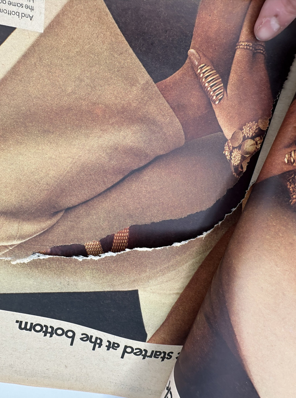 An interior page from The New York Times Magazine, November 30, 1969, showing a damaged section with a visible tear. This page highlights the magazine's vintage condition.