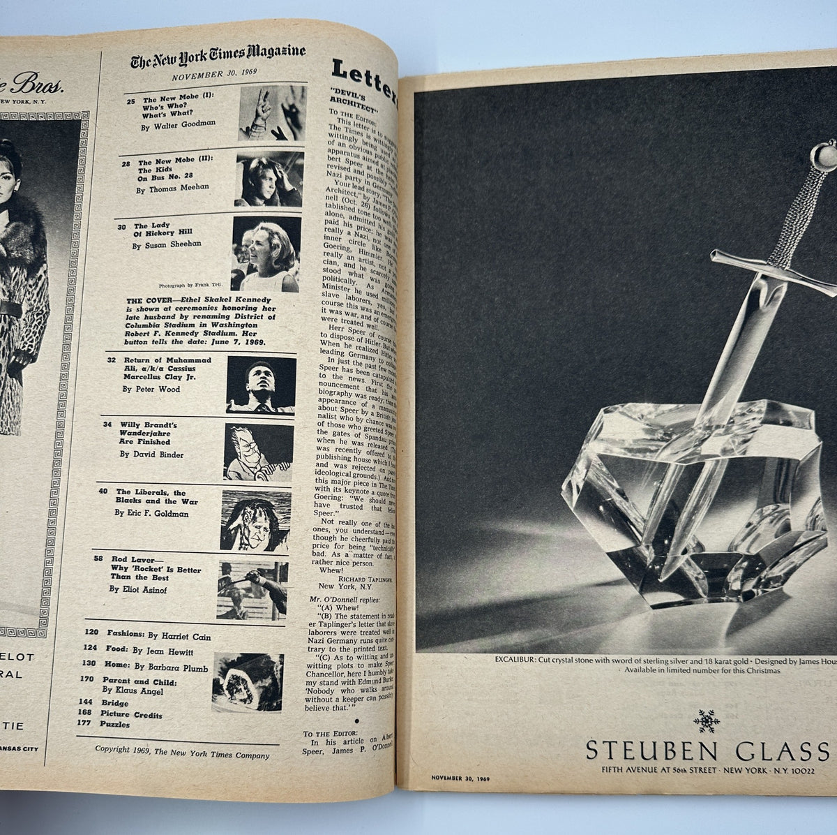 The New York Times Magazine from November 30, 1969, featuring a spread with a letter section and an advertisement for Steuben Glass. The pages reveal significant wear but all text remains legible.