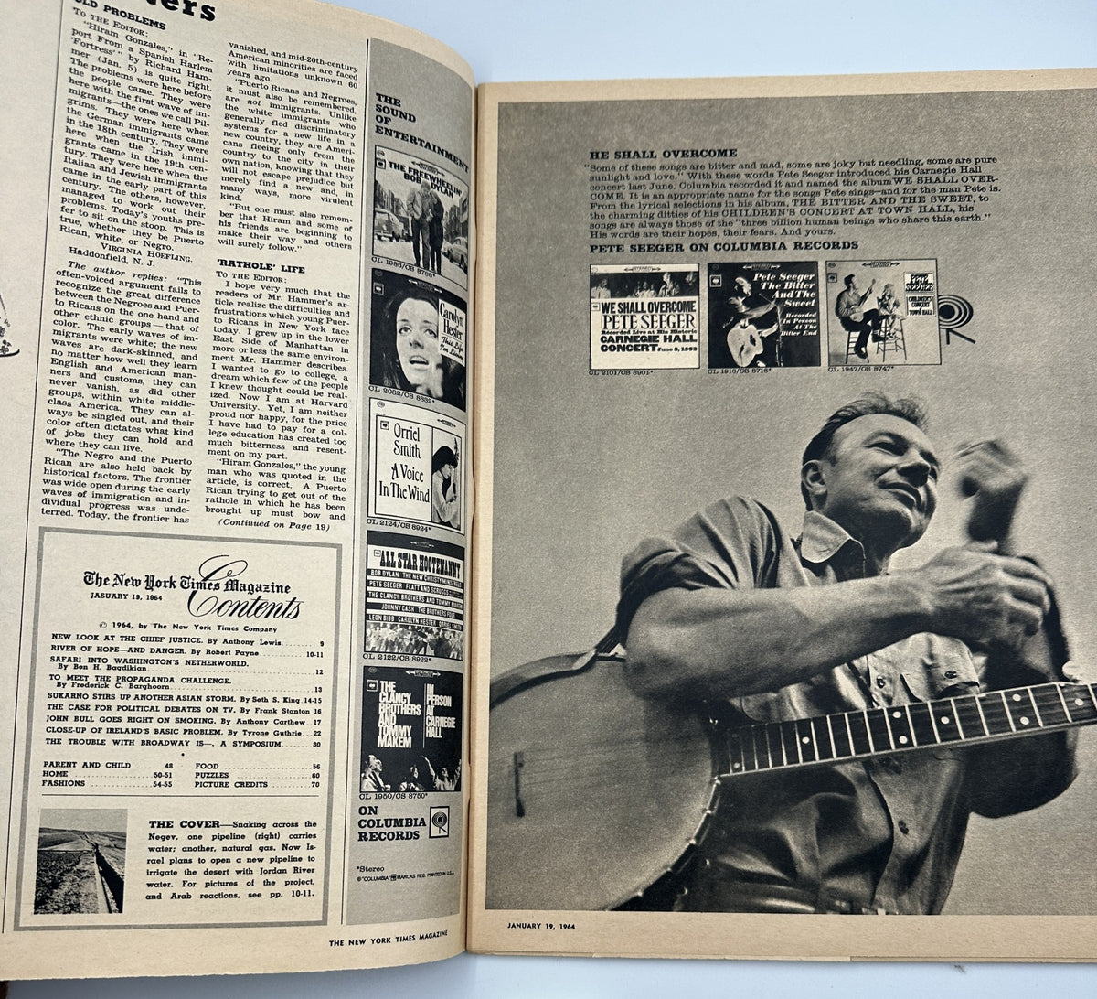 An interior page from The New York Times Magazine January 19, 1964 showcasing articles and images, including a musician with a guitar, alongside the Table of Contents for the issue.