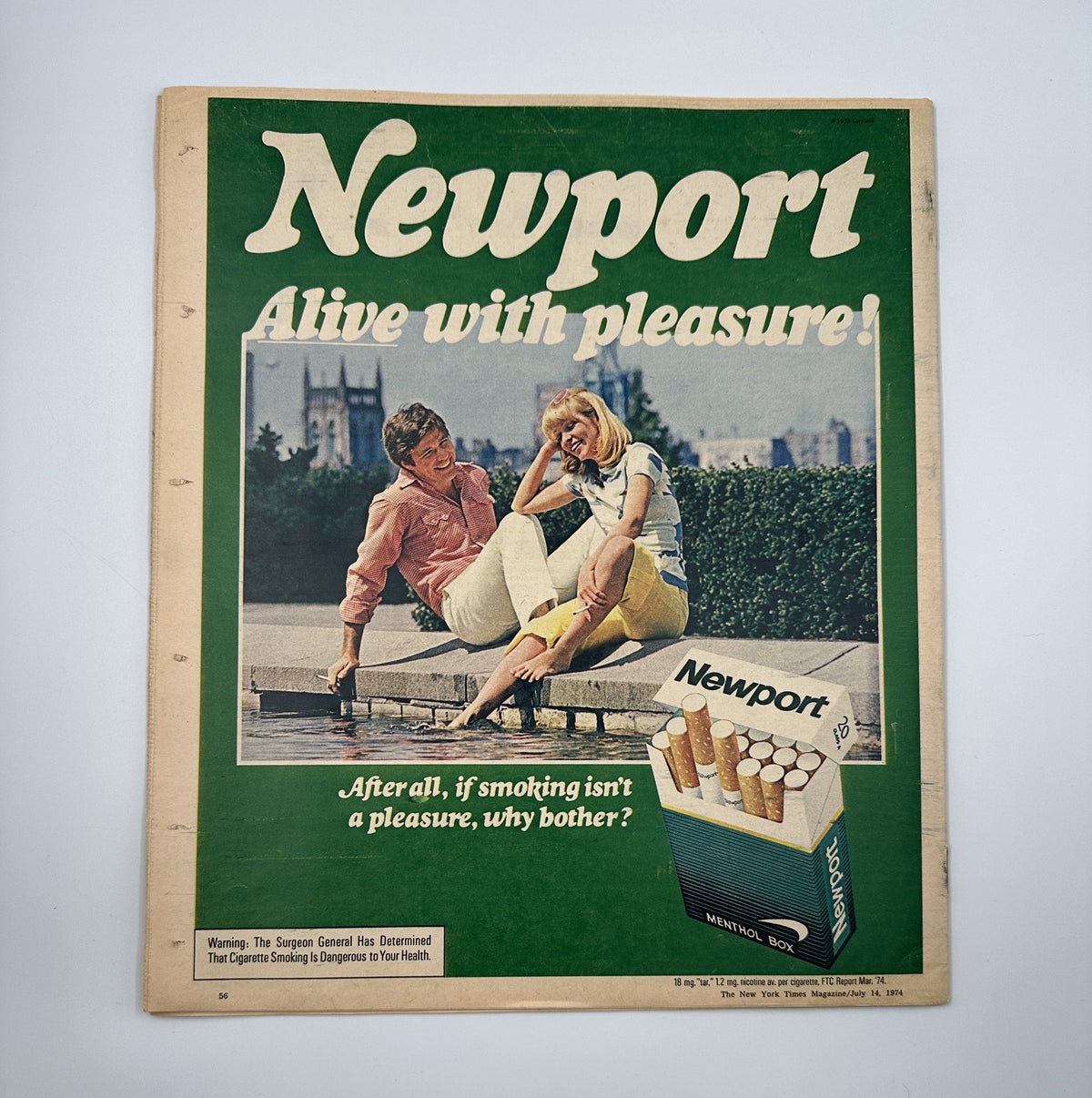 Advertisement cover from The New York Times Magazine July 14, 1974 showcasing Newport cigarettes with the slogan 'Alive with pleasure!', featuring a couple seated together.