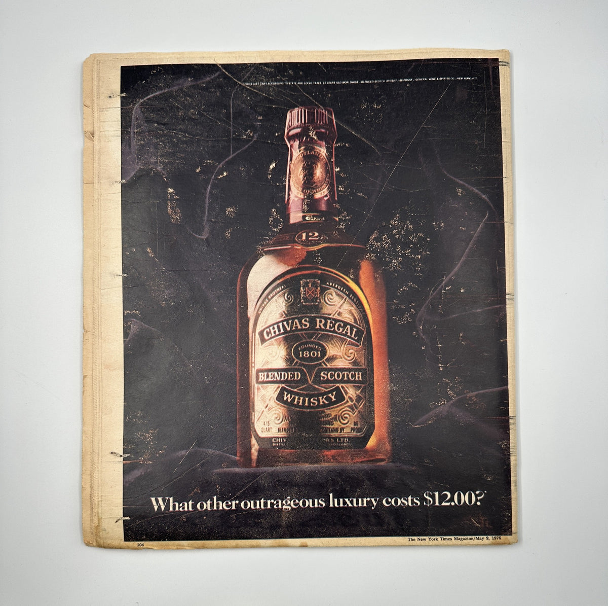 Back cover of The New York Times Magazine May 9, 1976 featuring an advertisement for Chivas Regal whisky with an iconic bottle image.