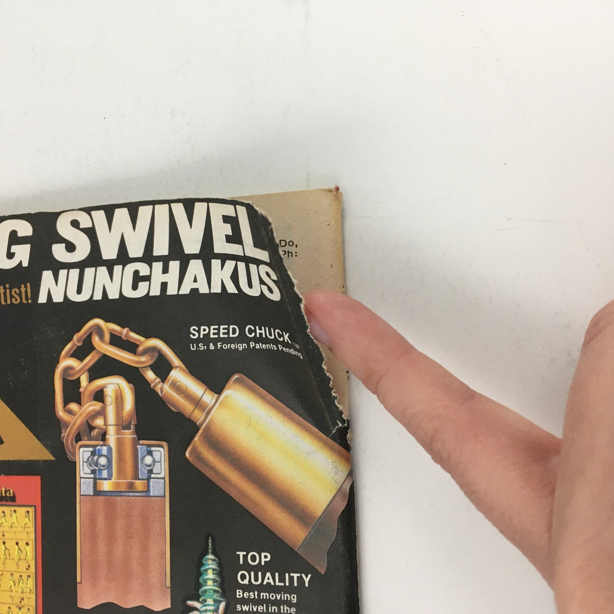 Back cover of Karate Illustrated Magazine November 1980 Vol 11 #11 illustrating a promotional image for a swivel nunchaku, highlighting martial arts gear popular in the 1980s.