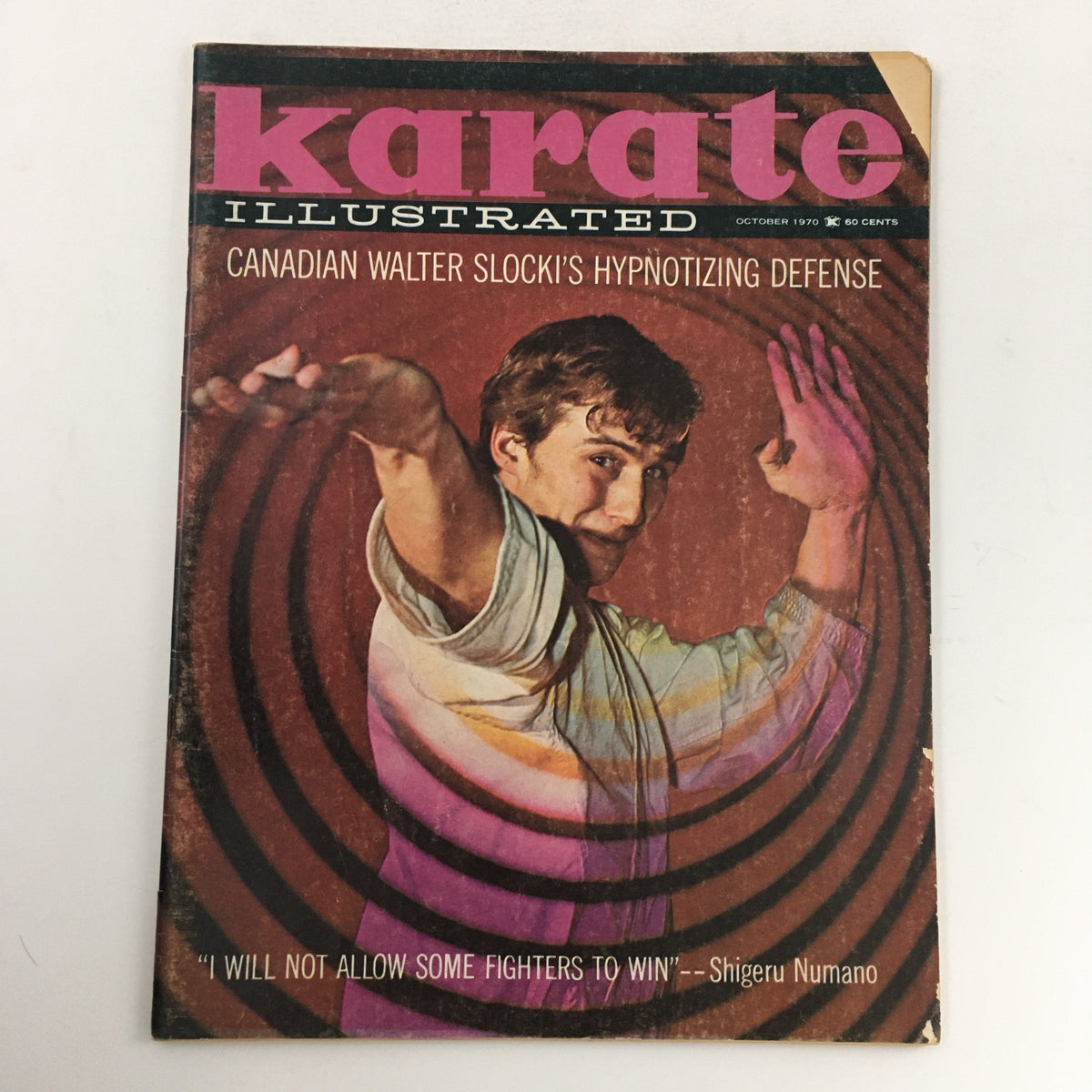 Cover of Karate Illustrated Magazine October 1970 Vol 1 #11 featuring Canadian Walter Slocki's hypnotizing defense, highlighting the martial arts theme with vibrant colors and a vintage design.