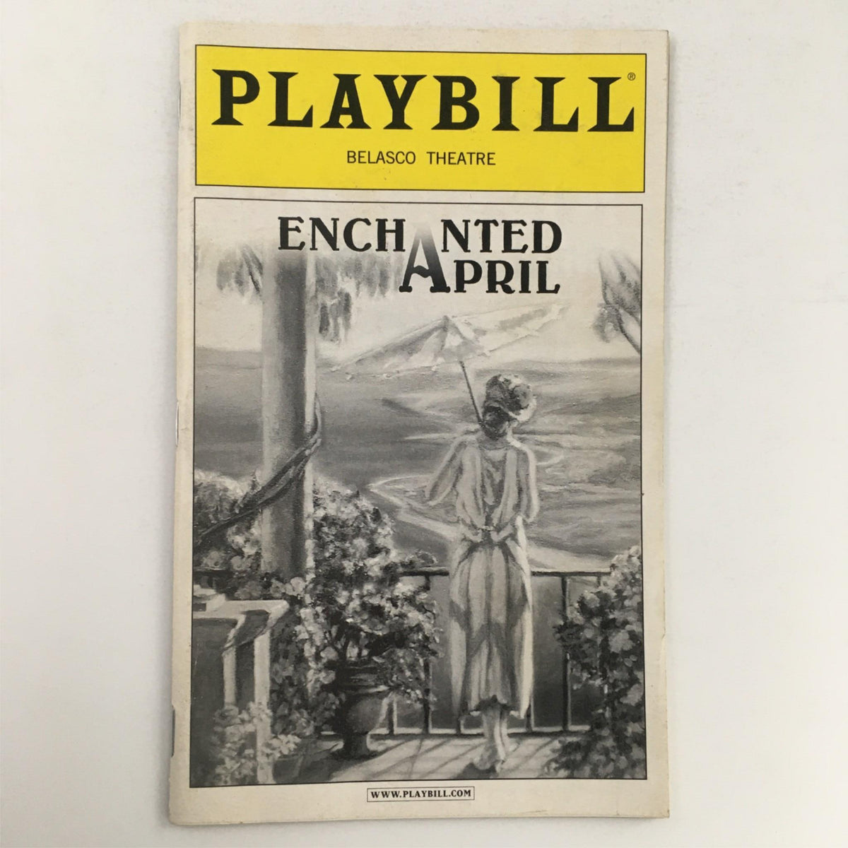 2003 Playbill for Enchanted April at Belasco Theatre featuring a scenic cover illustration that captures the essence of the production.