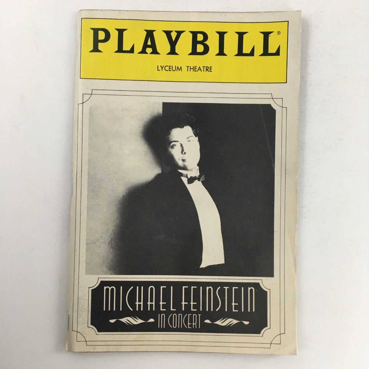 1988 Playbill featuring Michael Feinstein in Concert at the Lyceum Theatre, designed by Christopher Chadman, showcasing a black and white image of Feinstein.