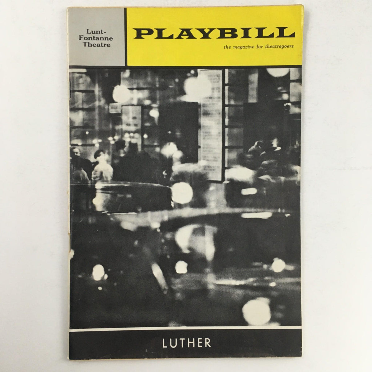 1964 Playbill for Luther at Lunt-Fontanne Theatre, featuring a vintage design with a classic black and white city scene.
