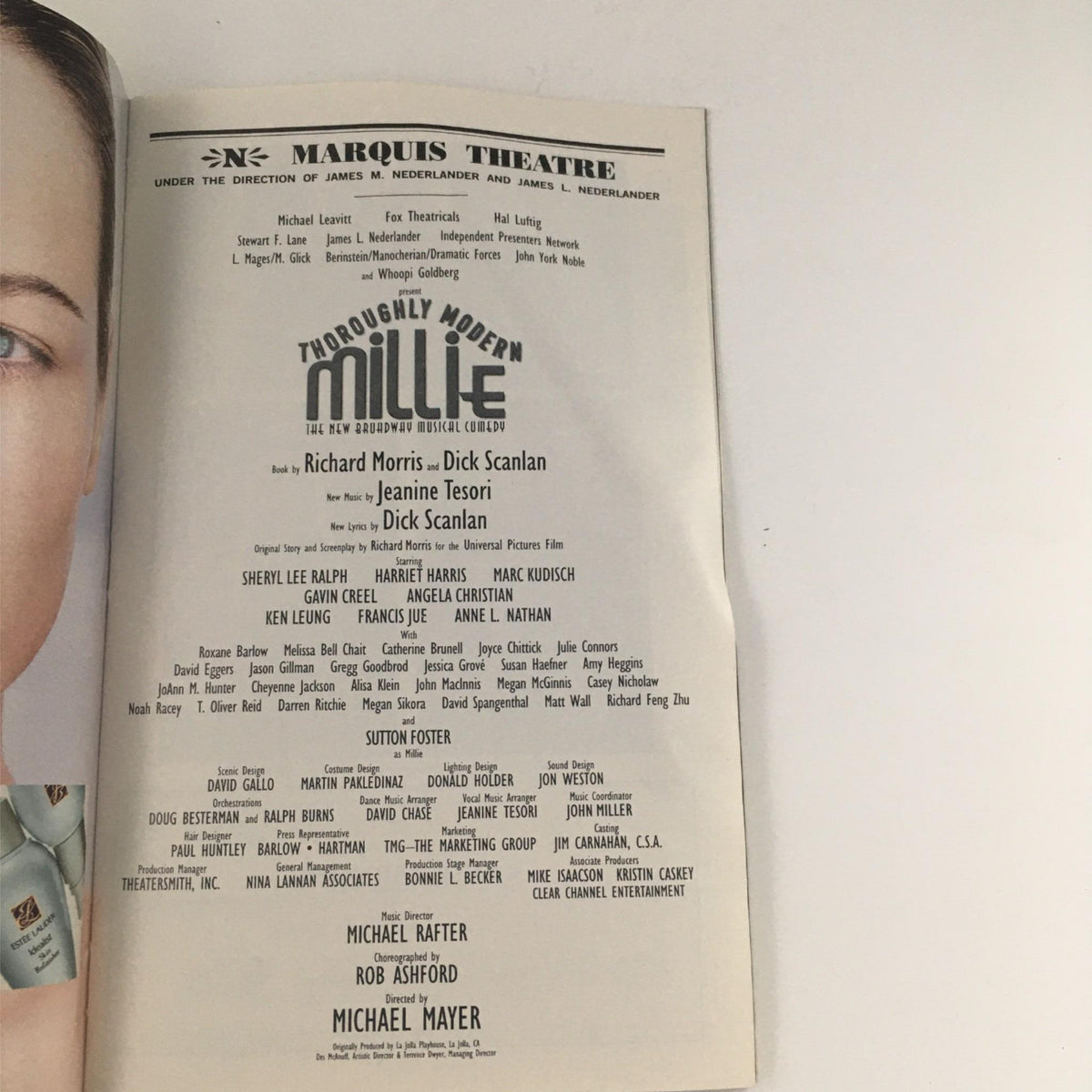 Inside page of the 2003 Playbill for Thoroughly Modern Millie detailing the cast and crew, including Richard Morris and Dick Scanlan, highlighting the artistic talents behind the Broadway production.