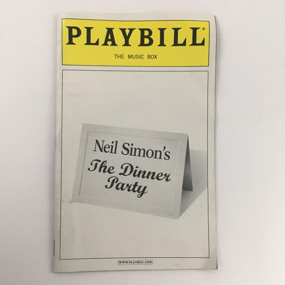2001 Playbill for Neil Simon's The Dinner Party at The Music Box Theatre, featuring a classic cover design with the play's title prominently displayed.